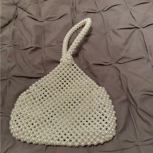 Small pearl clutch bag